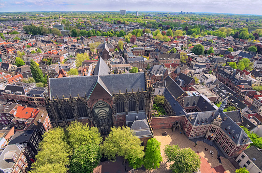 Arial view from the top of the tower of the St. Martins Cathedral at sunny day. Beautiful view of historic center of Utrecht with St. Martins Cathedral. Popular travel destination in the Netherlands