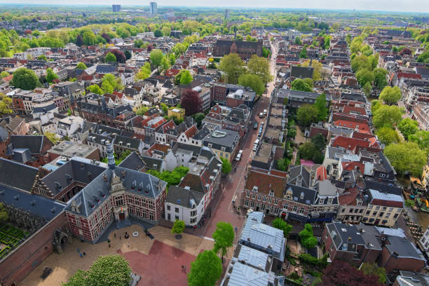 Arial view from the top of the tower of the St. Martins Cathedral at sunny day. Beautiful view of streets with ancient buildings of Utrecht. Popular travel destination in the Netherlands Arial view from the top of the tower of the St. Martins Cathedral at sunny day. Beautiful view of streets with ancient buildings of Utrecht. Popular travel destination in the Netherlands. netherlands aerial stock pictures, royalty-free photos & images