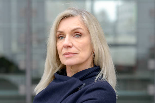 istock Middle-aged woman looking thoughtfully at camera 1096375970