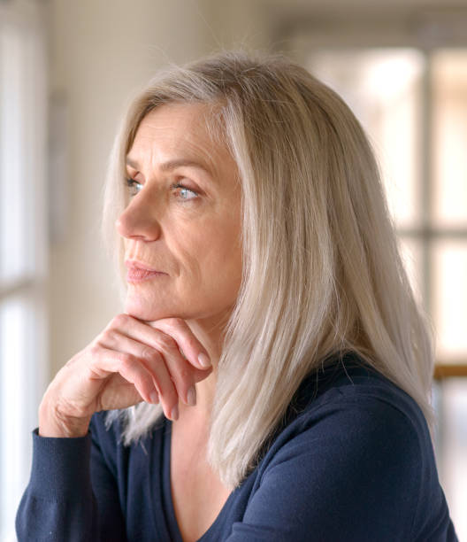 istock Pretty thoughtful woman with serious expression 1096380336
