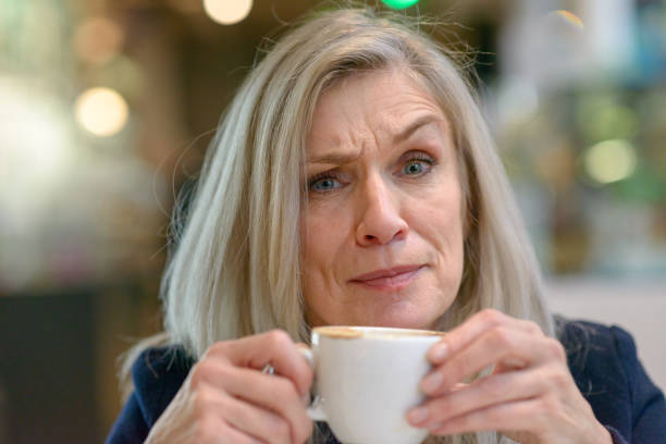 istock Puzzled or disbelieving middle aged woman 1096381920