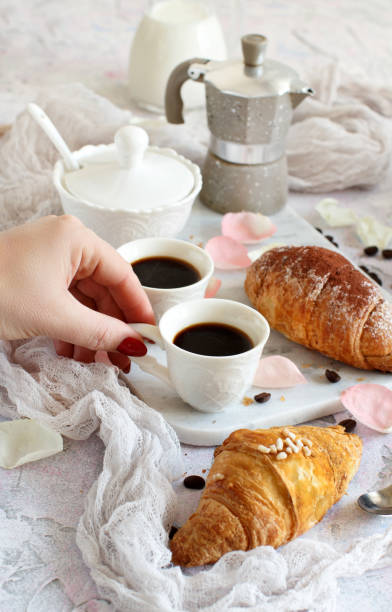 istock Breakfast with coffee and croissant 1096382628