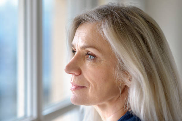 istock Thoughtful attractive mature blond woman 1096388276