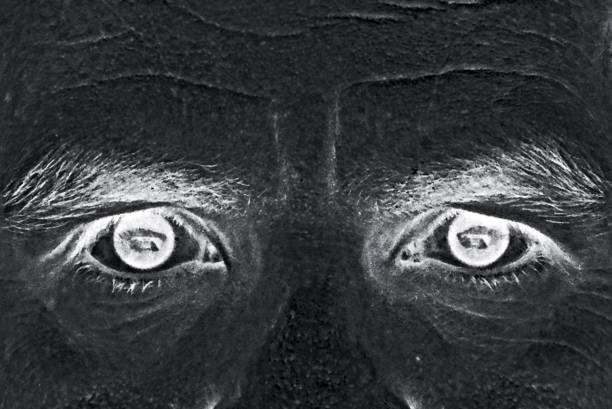istock Inverted black and white eyes closeup 1096396754