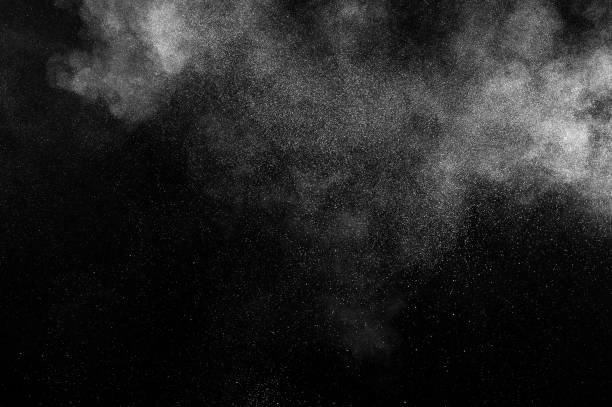 istock Freeze motion of white particles on black background. 1096397318