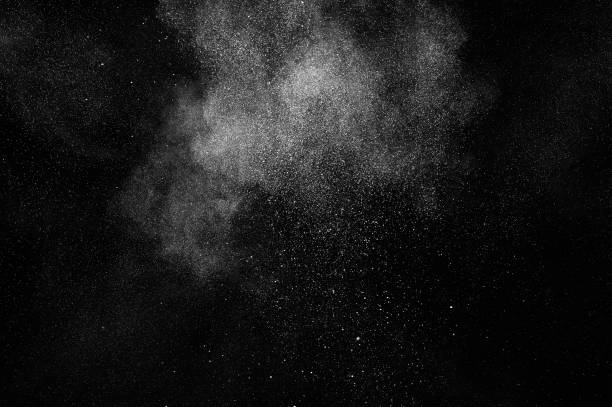 istock Freeze motion of white particles on black background. 1096397328