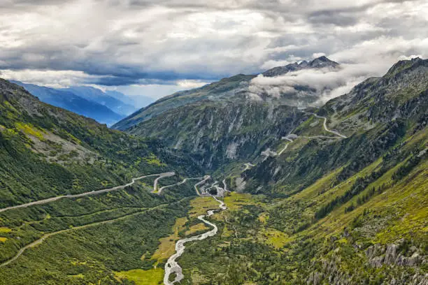 steep and winding pass roads lead from valley to valley in the alps of switzerland. The Furka and Grimsel passes connect Central Switzerland with the Valais and the Bernese Oberland.