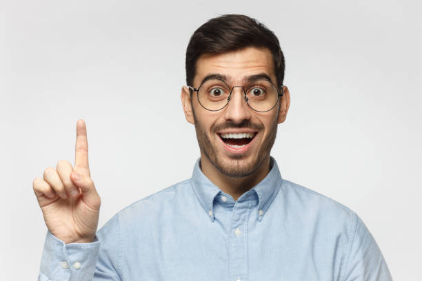 istock I have an idea! Handsome business man, making gesture with index finger. Eureka, solution sign concept 1096419432