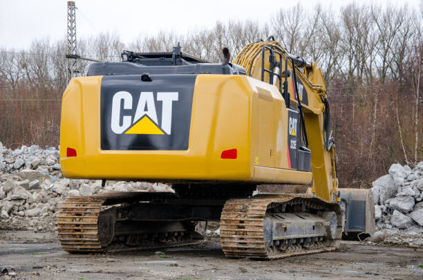 Litiz, PA, USA - April 23, 2016: Caterpillar heavy equipment lined up at Caterpillar dealer. Caterpillar is one of the largest manufacturers of heavy construction & mining equipment in the world.