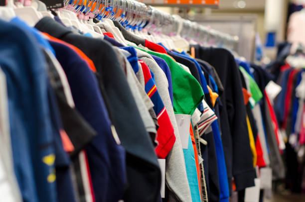 istock Clothes on hangers in the store. 1096427576