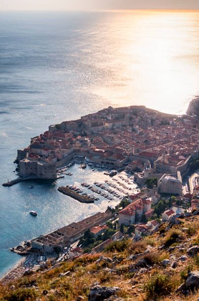 istock Dubrovnik Harbor in sunset 1096438812