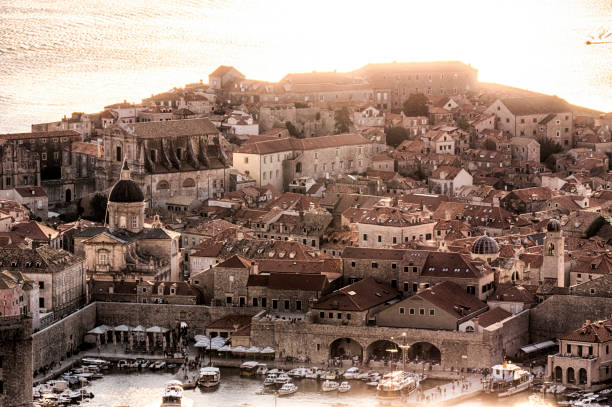 istock Dubrovnik Harbor in sunset 1096438890