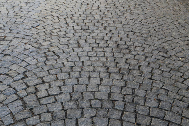 istock City. old cobbled surface of the road. 1096439696