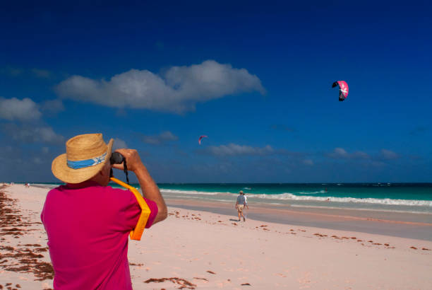 Bahamas Tourist at Pink Sand Beach. Dunmore Town, Harbour Island, Eleuthera. Bahamas dunmore town stock pictures, royalty-free photos & images