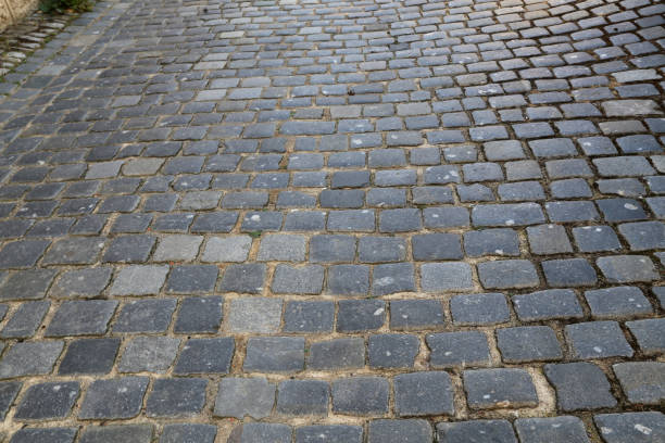 istock City. old cobbled surface of the road. 1096440654