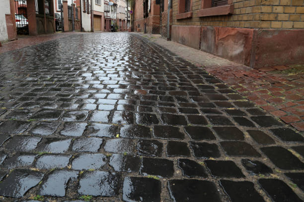 istock City. old cobbled surface of the road. 1096441262