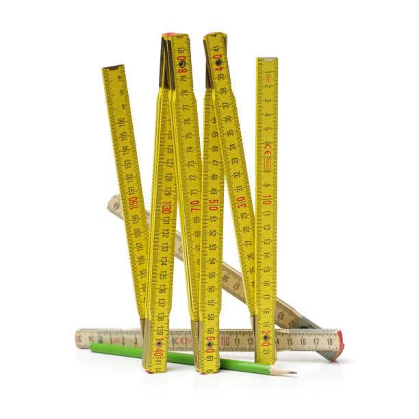 istock Wooden ruler and green pencil Isolated on a white background 1096442808