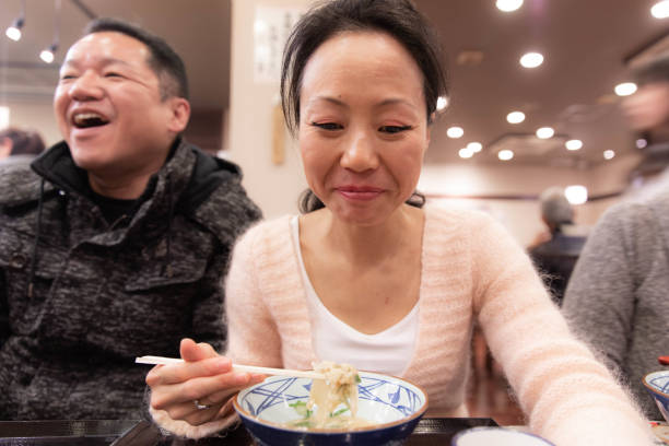 istock Family eating meal together 1096444172