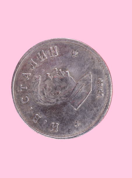 istock Russian coin 1 ruble 1949 CCCP isolated on pink 1096445906
