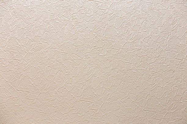 istock White light gray copy space background of natural cement or stone plastered stucco wall flat surface or cloth crumpled texture as retro pattern. Vintage or grunge background. 1096449246