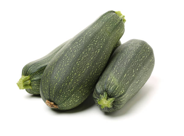 istock Green squash zucchini isolated on the white background 1096449482