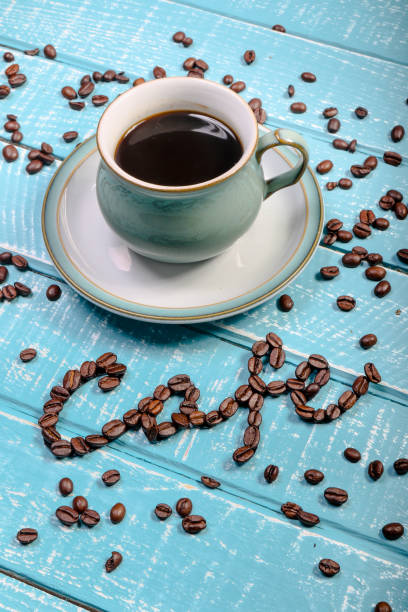 istock Cup of coffee on a wooden background 1096455498