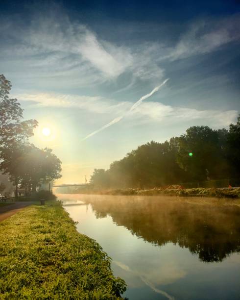 istock River sunrise reflected in the water 1096455598
