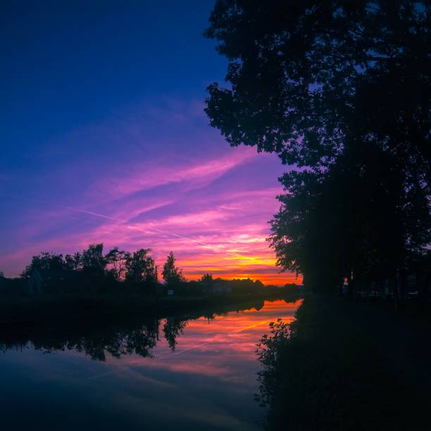 istock River sunrise reflected in the water 1096455886
