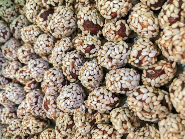 istock almonds sesame peanuts, photo background from variety of nuts 1096461422