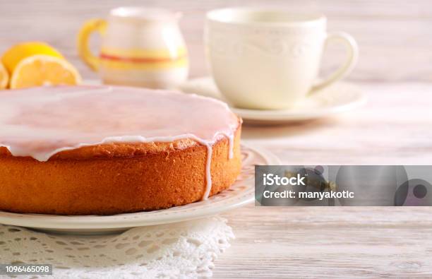 Lemon And Yogurt Cake With Icing Stock Photo - Download Image Now - Cake, Yogurt, Glazed Food