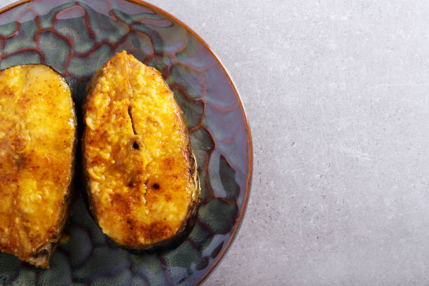 istock Fried wels cat fish steaks on plate 1096466374