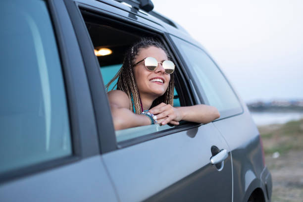 istock Woman looking through car window 1096476638