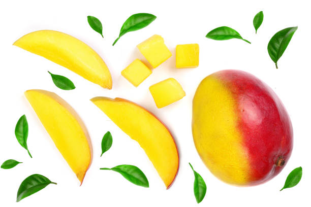 istock Mango fruit decorated with leaves isolated on white background close-up. Top view. Flat lay 1096477924
