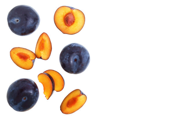 istock plums isolated on a white background with copy space for your text. Top view. Flat lay pattern 1096477946