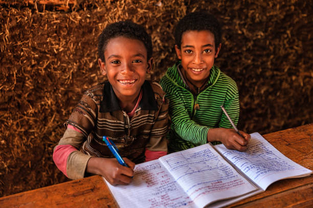 istock African children during the class, East Africa 1096482444