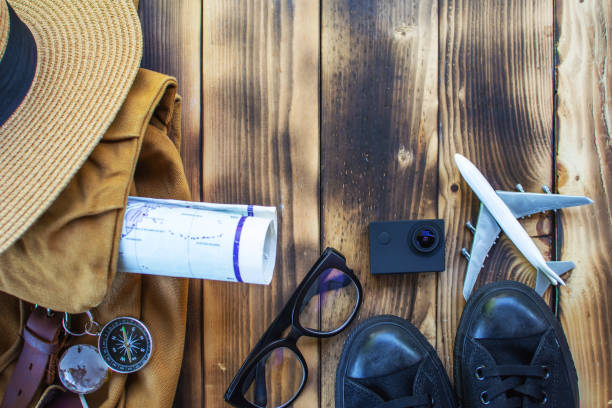 istock Top View Backpack and accessory for journey traveling on vacation on wood background. 1096484080