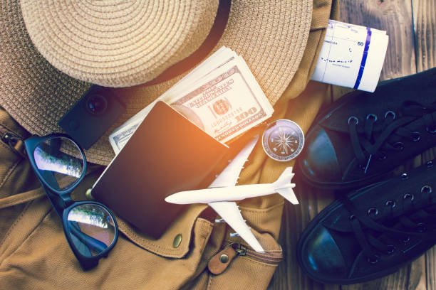 istock Top View Backpack and accessory for journey traveling on vacation on wood background. 1096484408