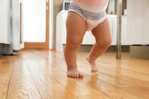 istock First steps of a baby 1096484454