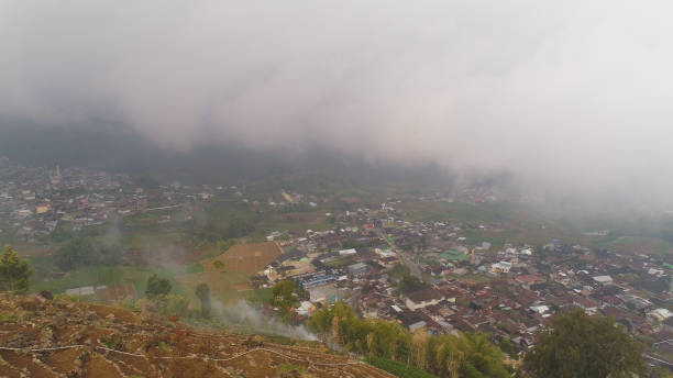 istock Mountain landscape farmlands and village Java Indonesia 1096487392