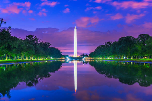 Washington Monument on the Reflecting Pool in Washington, D.C. Washington Monument on the Reflecting Pool in Washington, D.C. USA at dawn. washington monument reflecting pool stock pictures, royalty-free photos & images