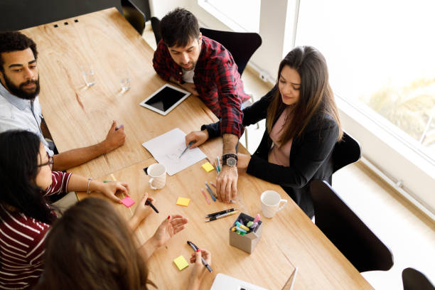 istock Team meeting to discuss project 1096494086