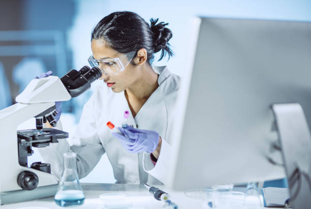 male scientist working in the laboratory - hematology imagens e fotografias de stock