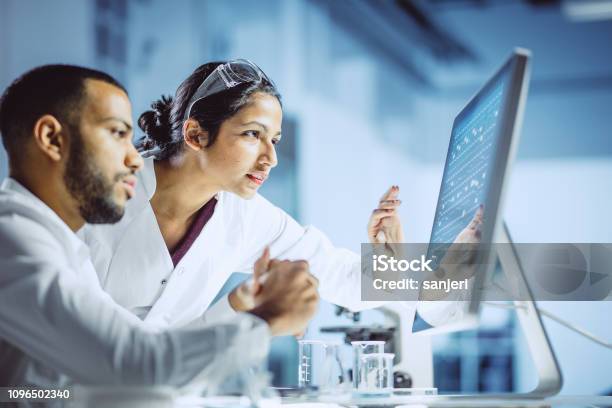 Scientists Working In The Laboratory Stock Photo - Download Image Now - Healthcare And Medicine, Laboratory, Research