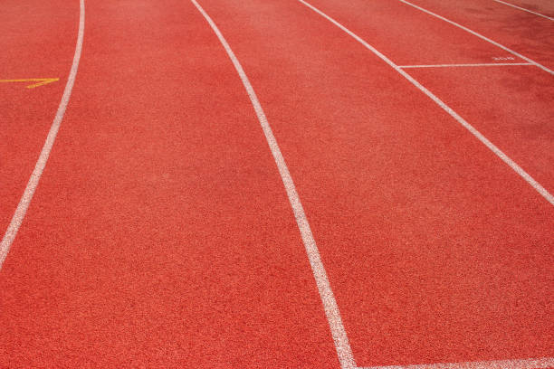 istock Red running track Synthetic rubber on the athletic stadium. 1096502710