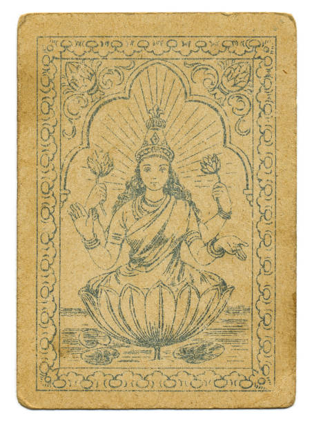 This Hindu goddess with four arms is Lakshmi, the Hindu goddess of wealth and fortune. As here, she is usually shown sitting in a lotus flower (water lily) and also holding them in her hands. Thus, the lotus flower is a symbol of purity and enlightenment amid ignorance. This playing card has square corners, typical of the mid- to late-19th century. Ravi Varma Press began in 1892 but was aready deep in debt by 1899. The press was sold and the factory went up in flames in 1972.
