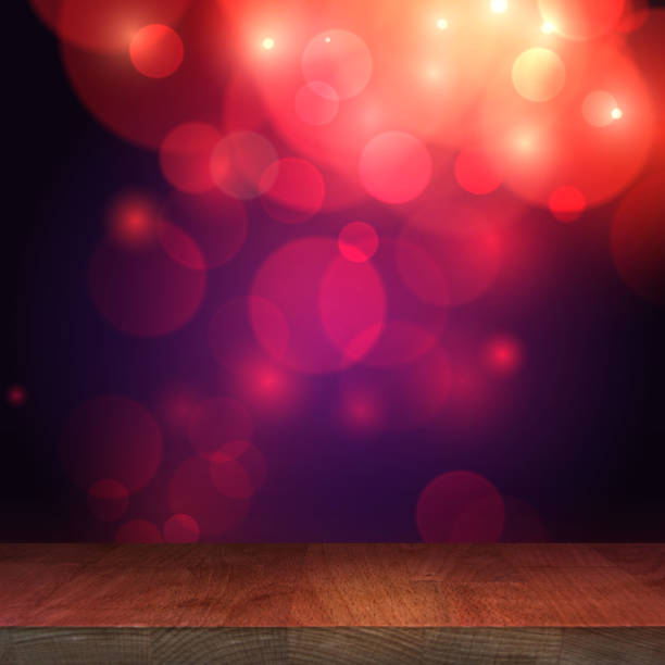 istock Wooden stage top table with blurred bokeh background, empty wooden table with a festive background 1096507854