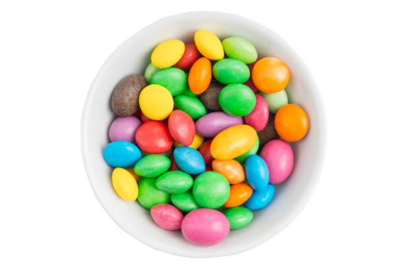 istock bowl filled with delicious multicolored candy isolated on white background 1096509694