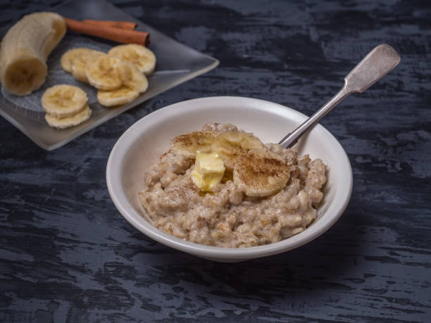istock Hot oatmeal and sliced banana for breakfast. 1096510354