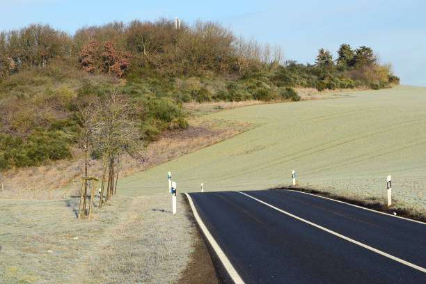 istock country road in winter, Eifel 1096514006