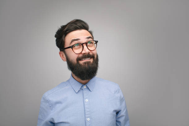 istock Excited man looking up in enlightenment 1096522252